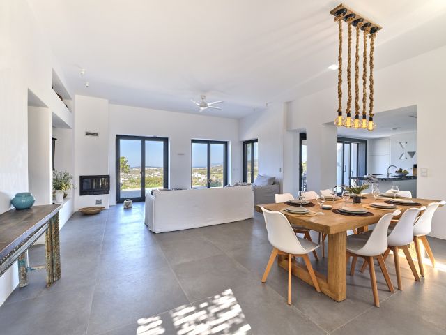 Living and dining area in House 1