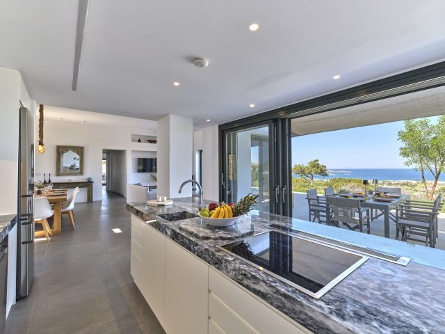 Fully equipped kitchen in House 1
